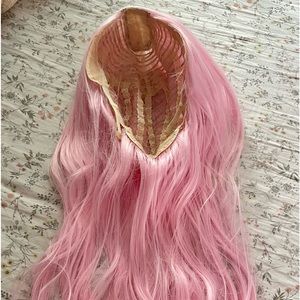 Faux pink clip in wig